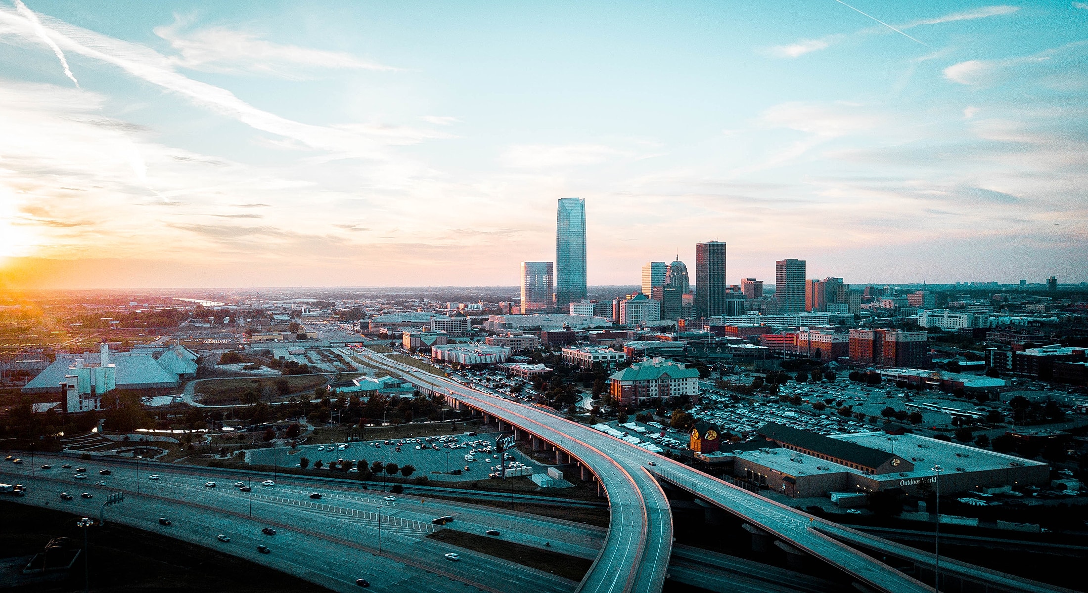 Skyline of a city during sunset.