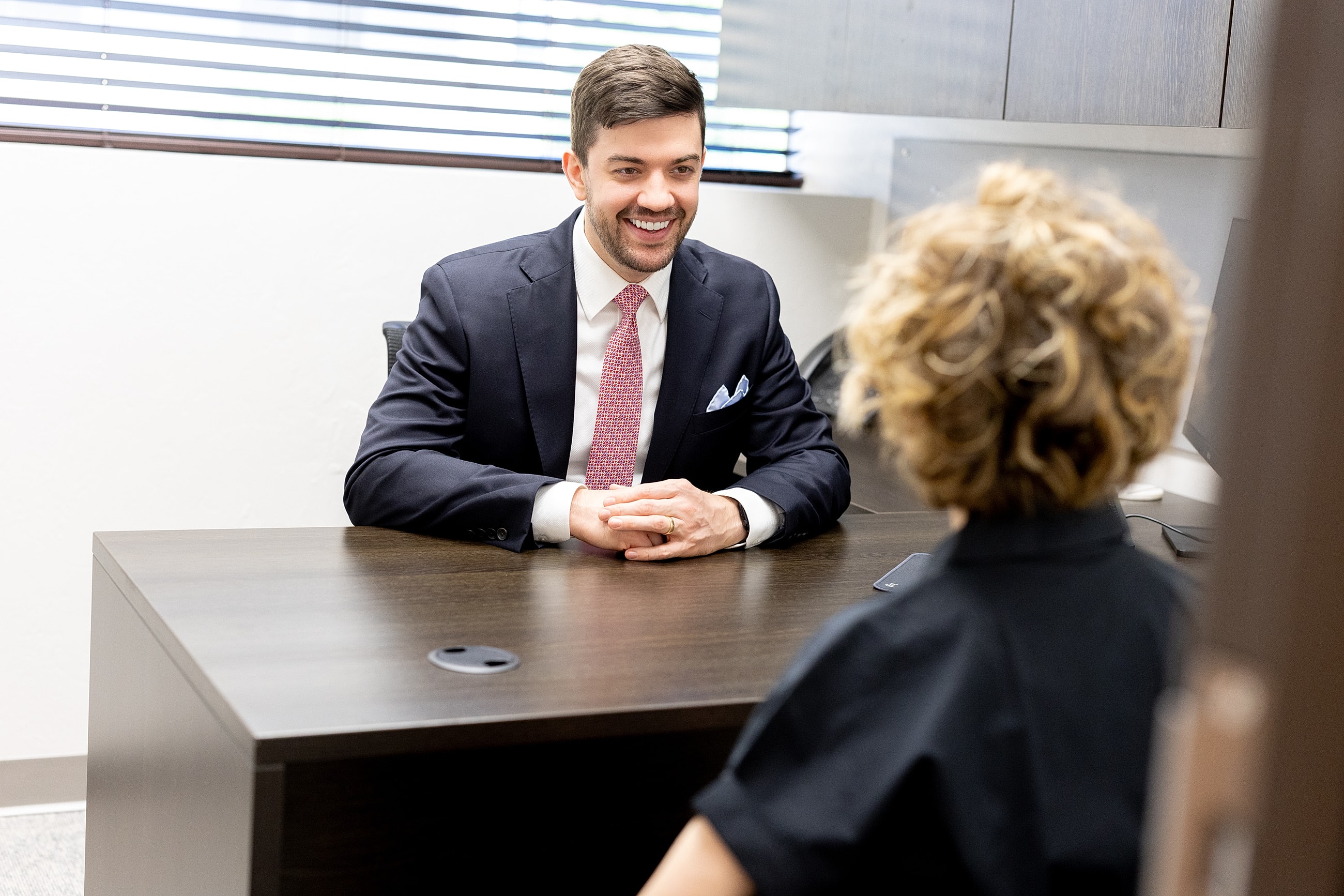 Business meeting in a modern office setting.